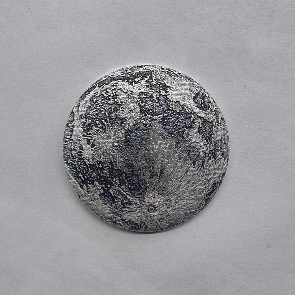 moon coin, lunar surface coin, moon texture coin, space collectible coin, decorative metal coin, round souvenir coin, collectible badge coin, lunar collectible, novelty moon coin, astronomy coin souvenir, metal collectible coin, space themed coin, collectible souvenir coin, moon design coin, unique collectible coin